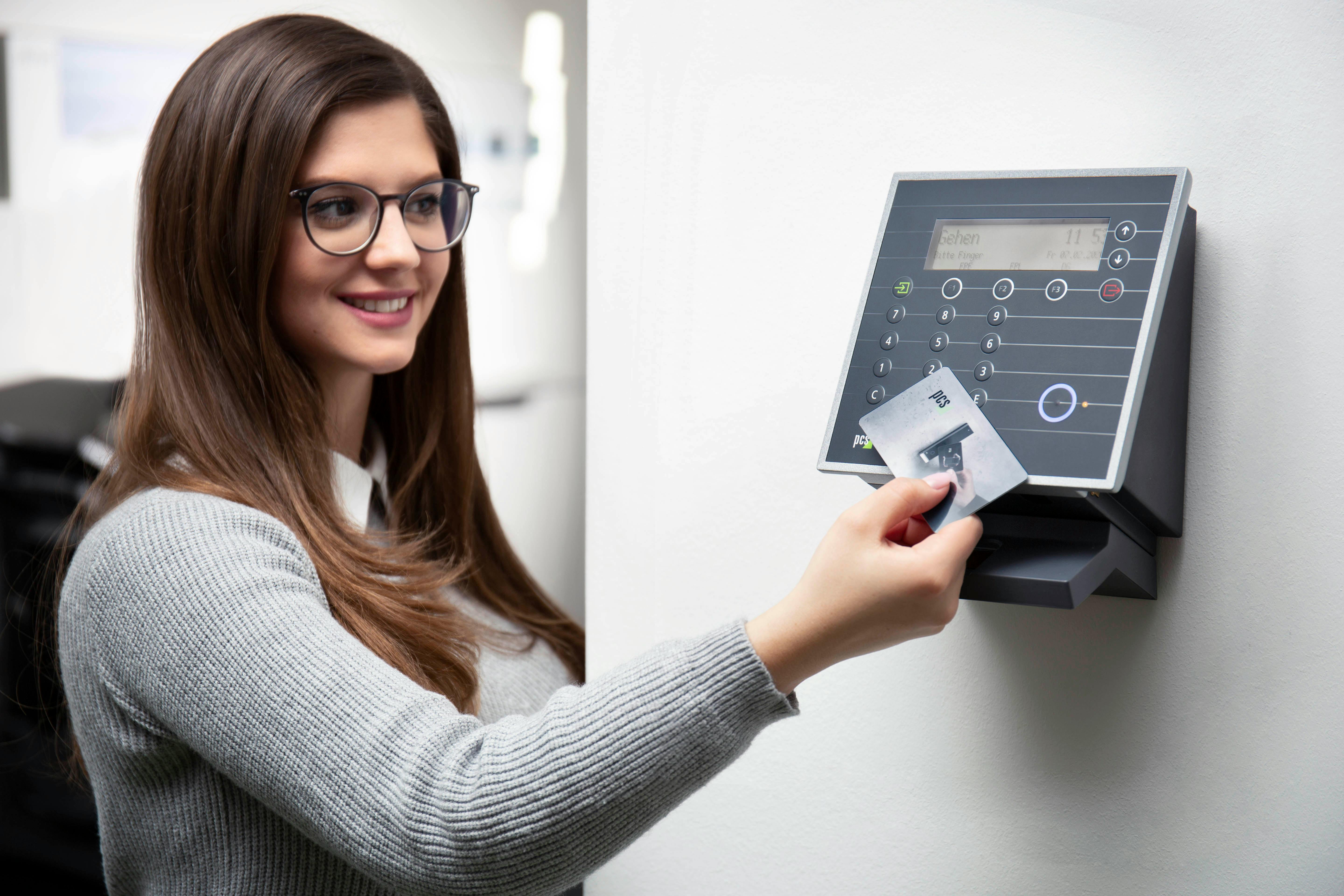 Access control reader in use with a credential card